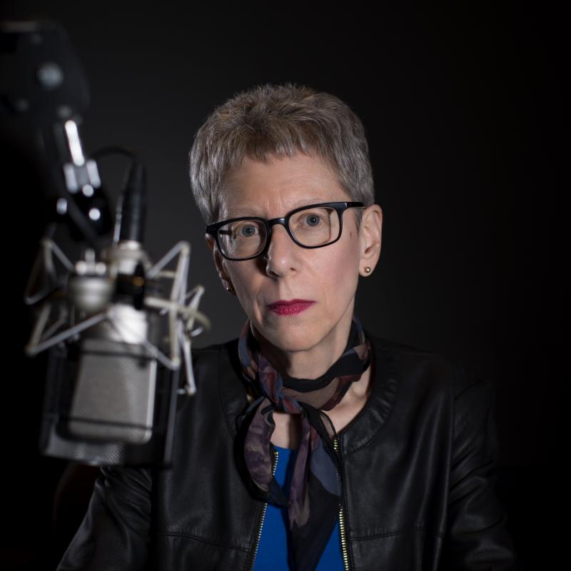 Terry Gross at her microphone in 2018